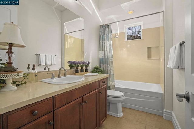 full bathroom featuring toilet, tile patterned flooring, vanity, and shower / tub combo with curtain