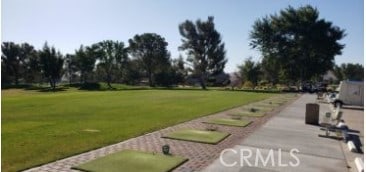 view of home's community featuring a lawn