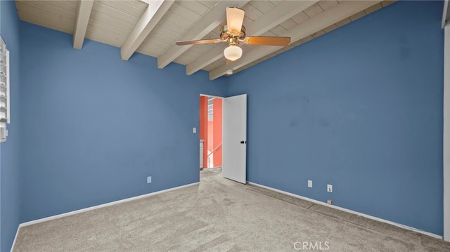 unfurnished room with ceiling fan, light colored carpet, wood ceiling, and beam ceiling