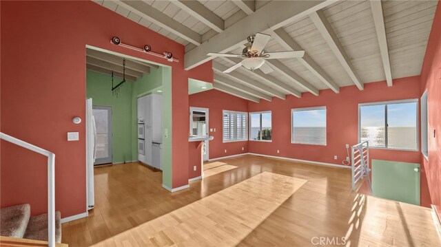 spare room featuring wood ceiling, ceiling fan, beam ceiling, high vaulted ceiling, and wood-type flooring