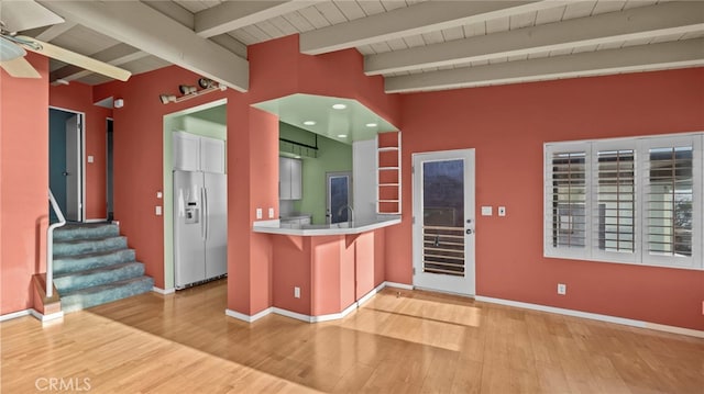 kitchen with ceiling fan and sink