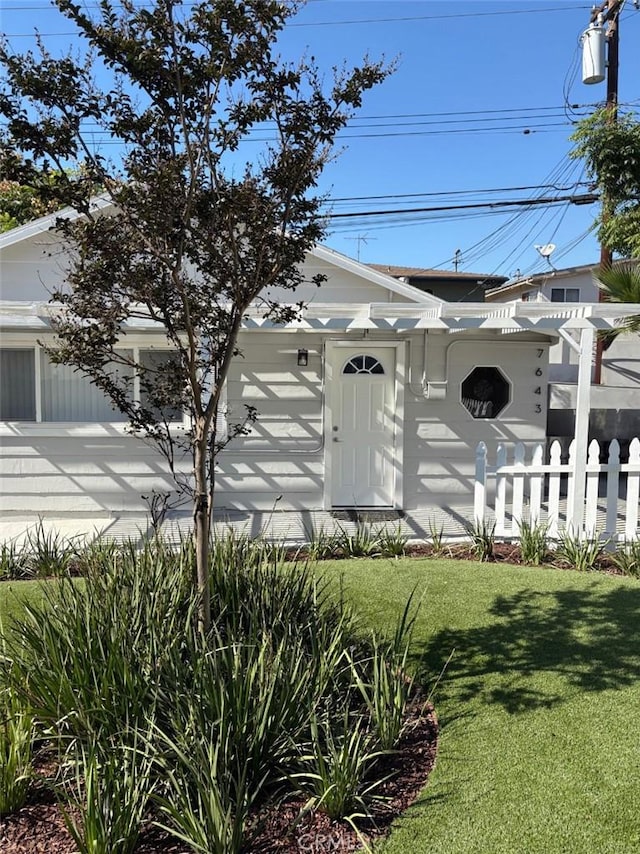 exterior space with a lawn