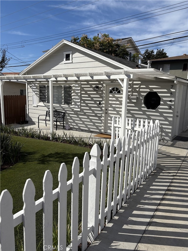 exterior space featuring a lawn