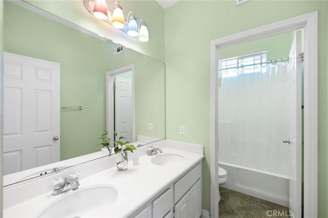 full bathroom featuring toilet, tile patterned floors, shower / bath combo, and vanity