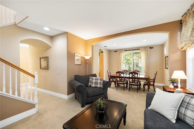 living room featuring light colored carpet