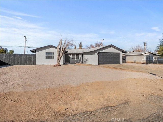 ranch-style house with a garage