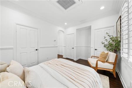 bedroom featuring dark wood-type flooring