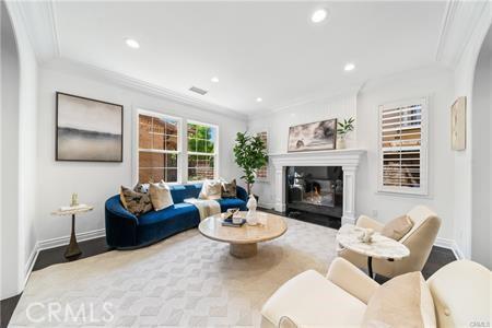 living room with crown molding