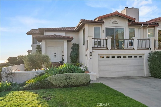 6527 Sandy Point Ct, Rancho Palos Verdes, CA 90275 - mediterranean / spanish house with driveway, a tile roof, stucco siding, and an attached garage