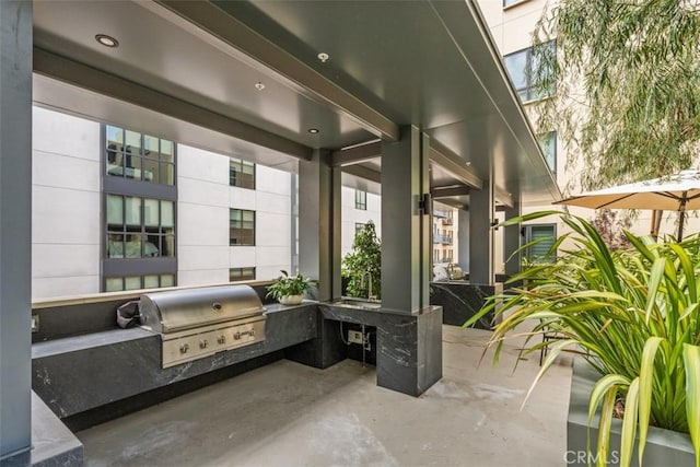 view of patio / terrace with an outdoor kitchen and grilling area