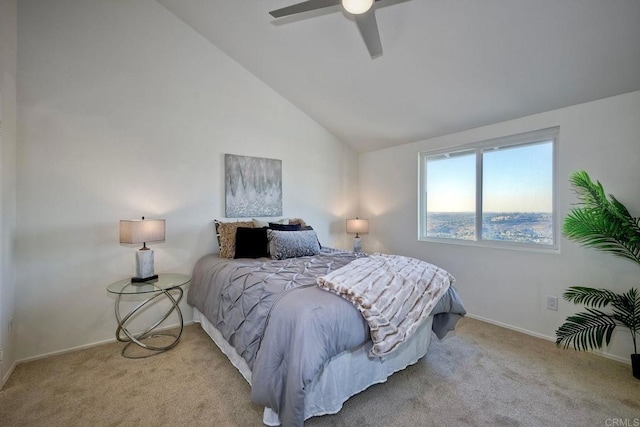 carpeted bedroom featuring ceiling fan and high vaulted ceiling