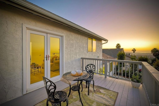 deck at dusk with french doors