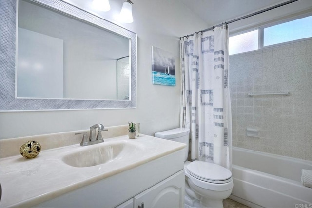 full bathroom featuring toilet, vanity, and shower / bath combo