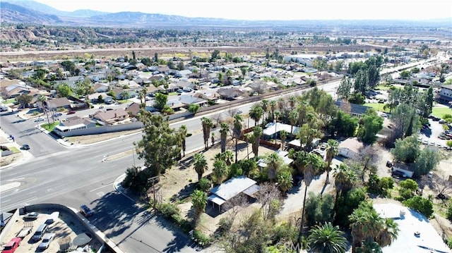 drone / aerial view featuring a mountain view