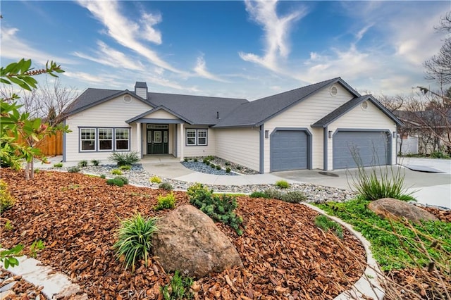 ranch-style home with a garage