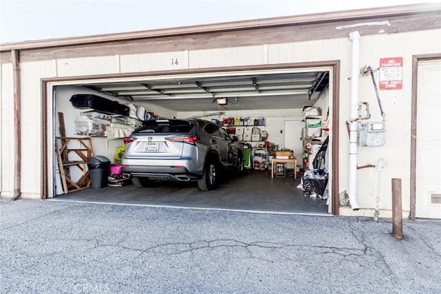 garage featuring a garage door opener