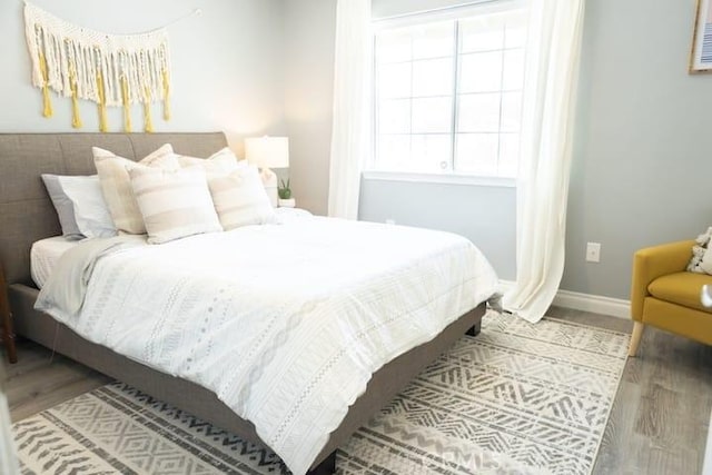 bedroom featuring hardwood / wood-style floors