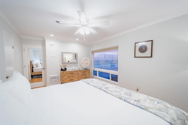 bedroom featuring ceiling fan and crown molding