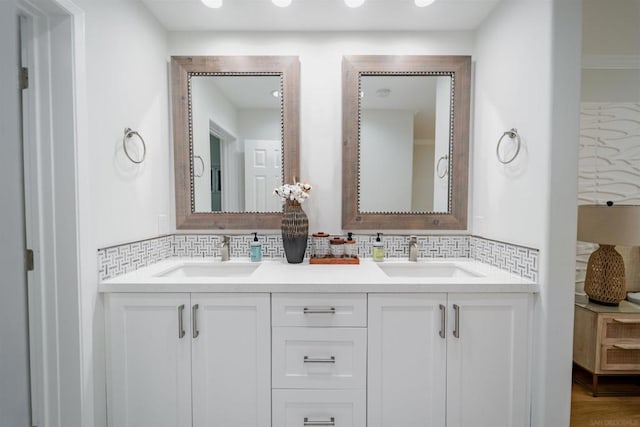 bathroom with backsplash and vanity