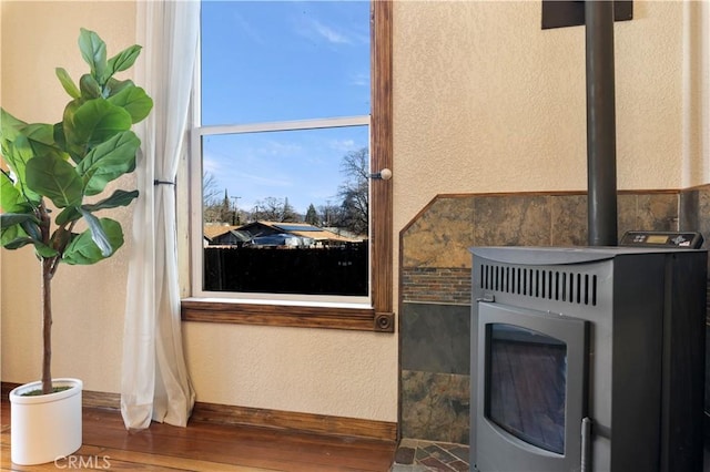 interior details with hardwood / wood-style flooring and washer / dryer