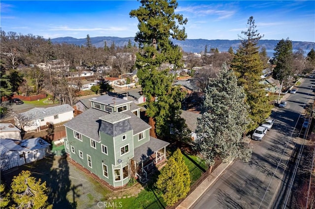 drone / aerial view featuring a mountain view