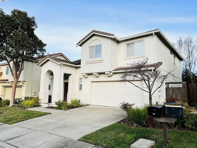 view of front of property with a garage