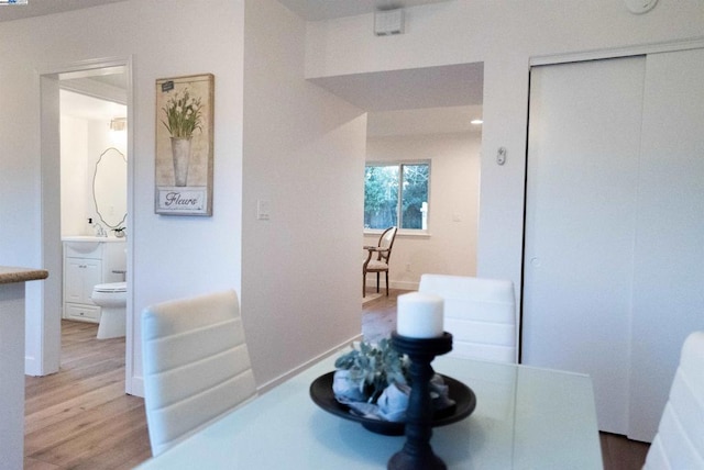 dining space featuring hardwood / wood-style flooring