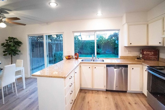 kitchen featuring white cabinetry, light hardwood / wood-style floors, kitchen peninsula, ceiling fan, and appliances with stainless steel finishes