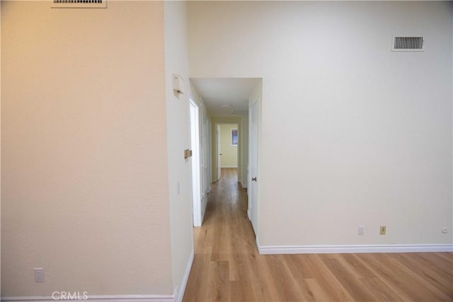 hall featuring light hardwood / wood-style floors