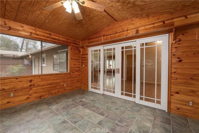 unfurnished sunroom featuring wood ceiling, ceiling fan, vaulted ceiling, and french doors