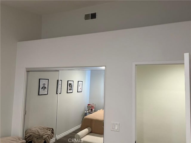 bedroom with wood-type flooring