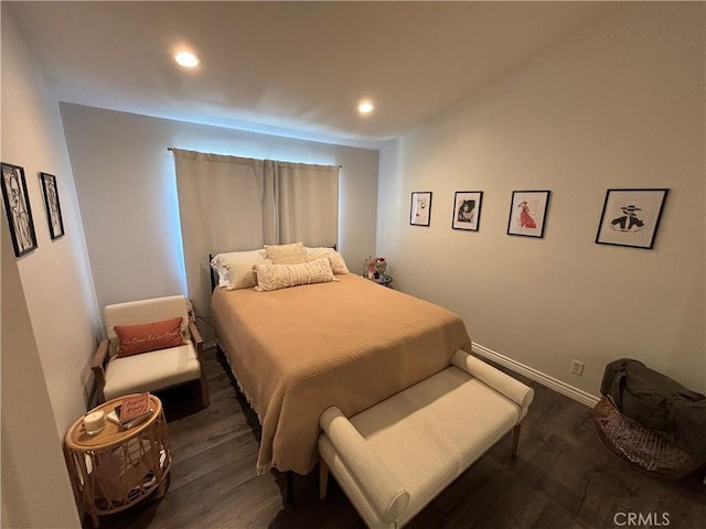 bedroom featuring dark wood-type flooring