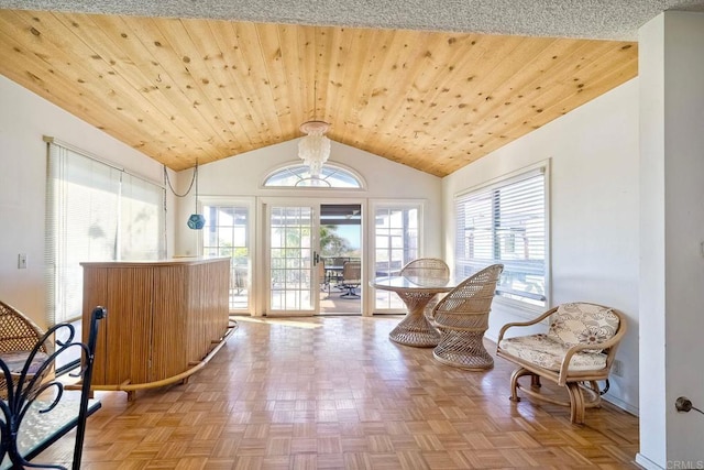 interior space with vaulted ceiling, parquet floors, and wooden ceiling