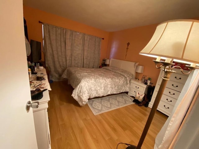 bedroom featuring light hardwood / wood-style floors