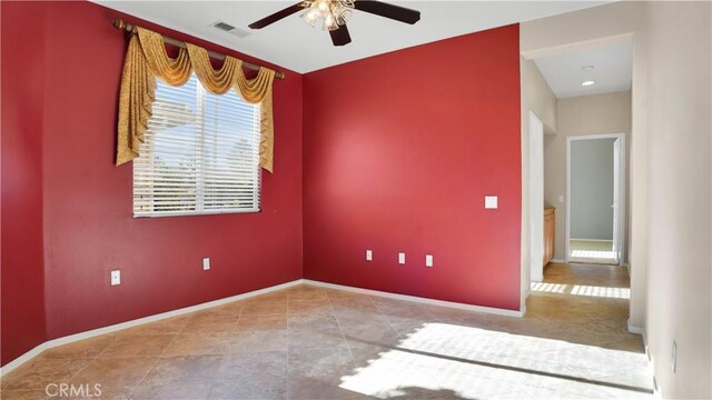 unfurnished room featuring ceiling fan