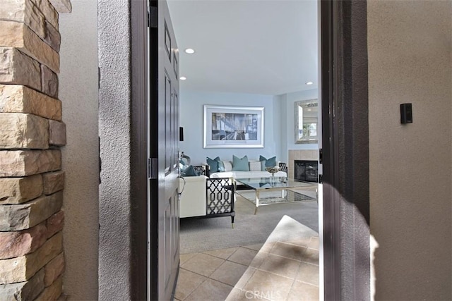 hallway with light tile patterned flooring