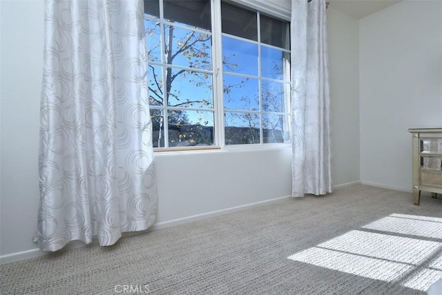 view of carpeted spare room