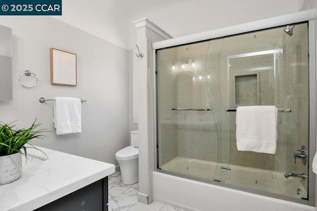 full bathroom with toilet, vanity, and shower / bath combination with glass door