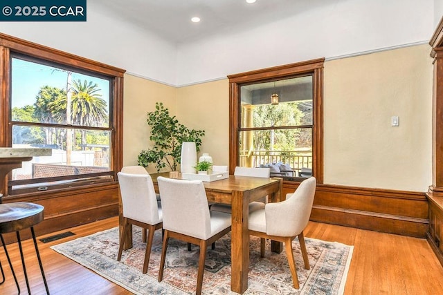 dining area with light hardwood / wood-style flooring