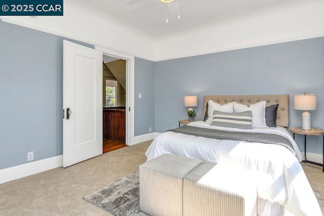 carpeted bedroom with ceiling fan