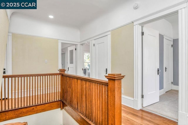 hallway featuring hardwood / wood-style flooring