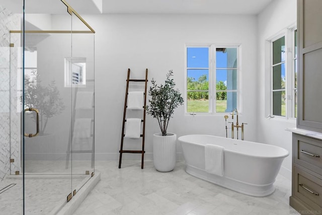 bathroom with independent shower and bath and a wealth of natural light