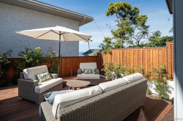 wooden deck featuring outdoor lounge area