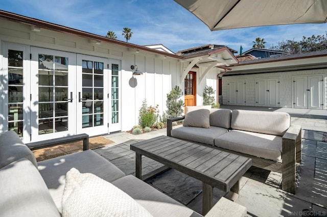 view of patio featuring outdoor lounge area and french doors