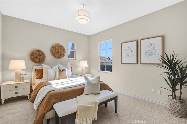 bedroom with light colored carpet