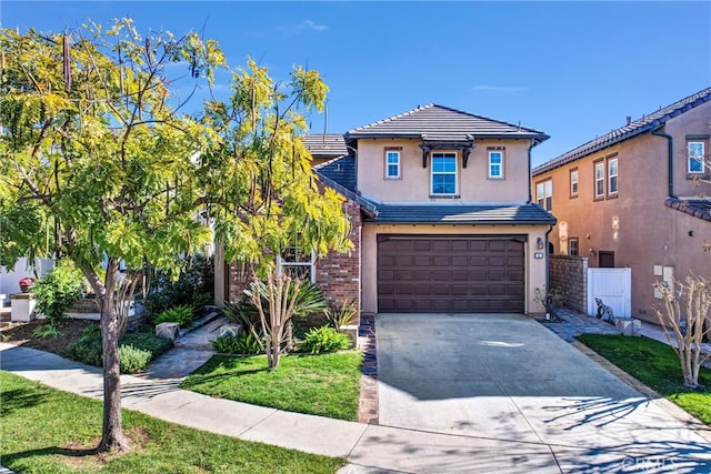 view of front of property with a garage