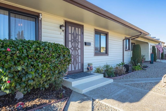 entrance to property with cooling unit