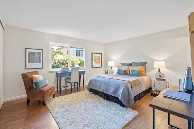 bedroom featuring hardwood / wood-style floors