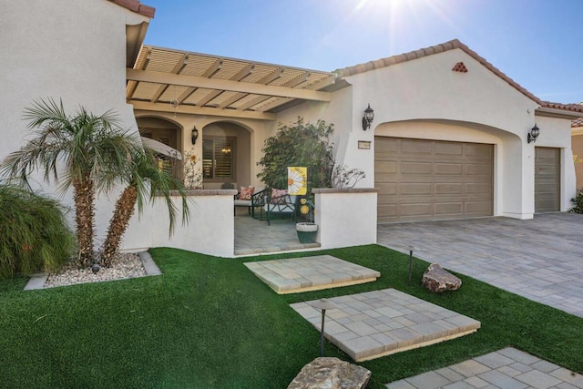 exterior space with a garage and a front yard