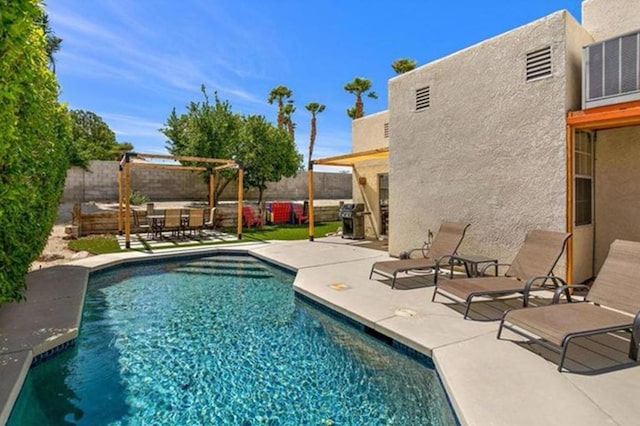 view of pool with a patio area